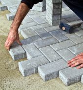 builder worker tiler tile stores built walkway or path